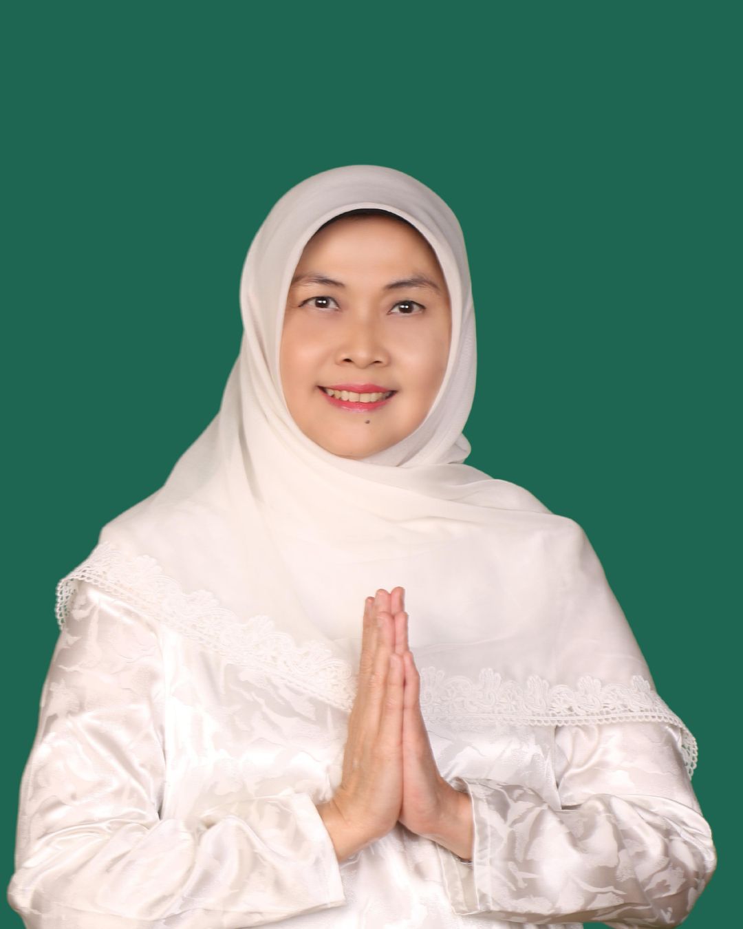 Hj. Evi Fatimah, S.Pd., M.Ag